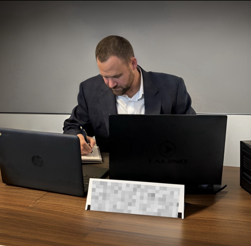 Christopher Whitehouse working at desk